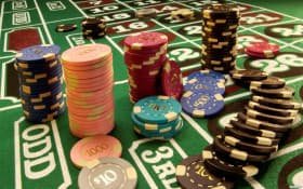 Filipino players enjoying royalbet on mobile phones across the Philippines